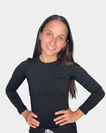 Black PolkaDot CoreSupport underscrub on model, front view