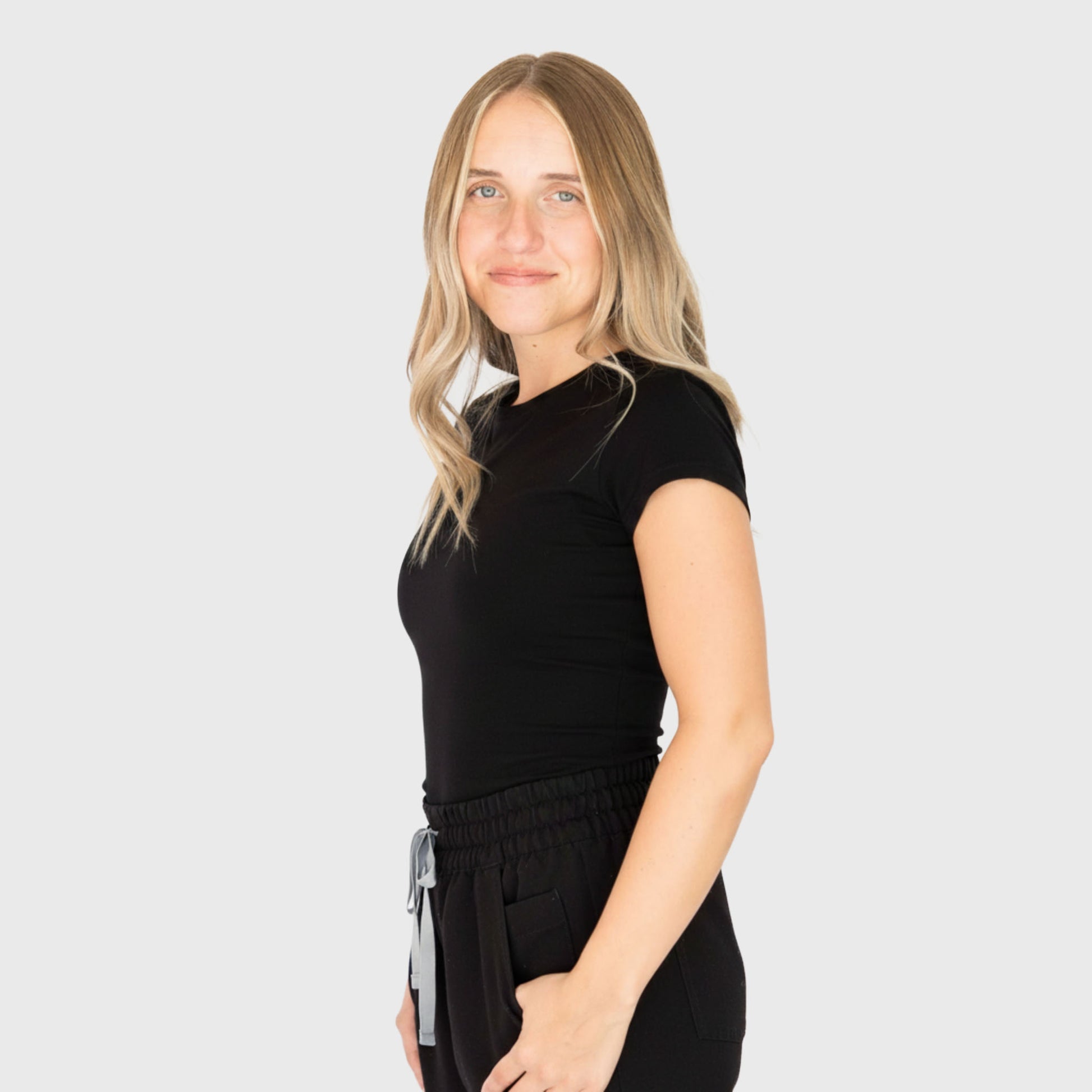 CloudSoft Short Sleeve underscrub in Black, on model